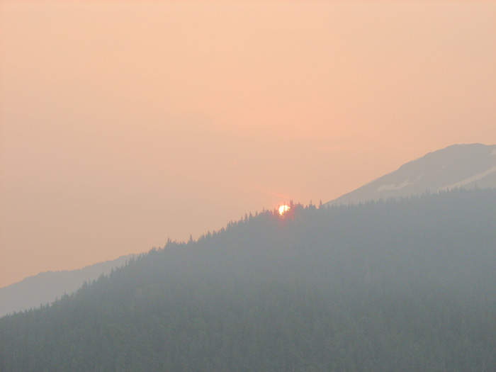 Sun Rising Over Smoke Obscured Mt. Roberts.