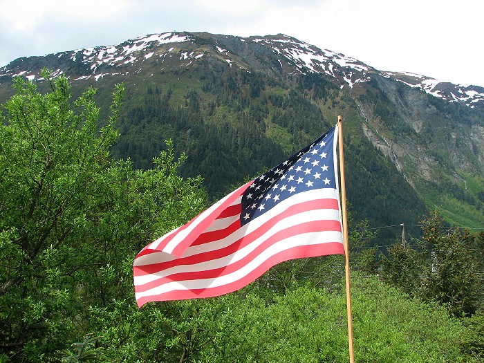 The flag of the United States of America on Memorial Day 2006, Mt. Juneau in the background.
